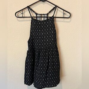 Black arrow  Sleeveless Patterned relaxed peplum top